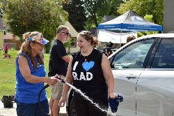 RAD car wash photo with hose and car